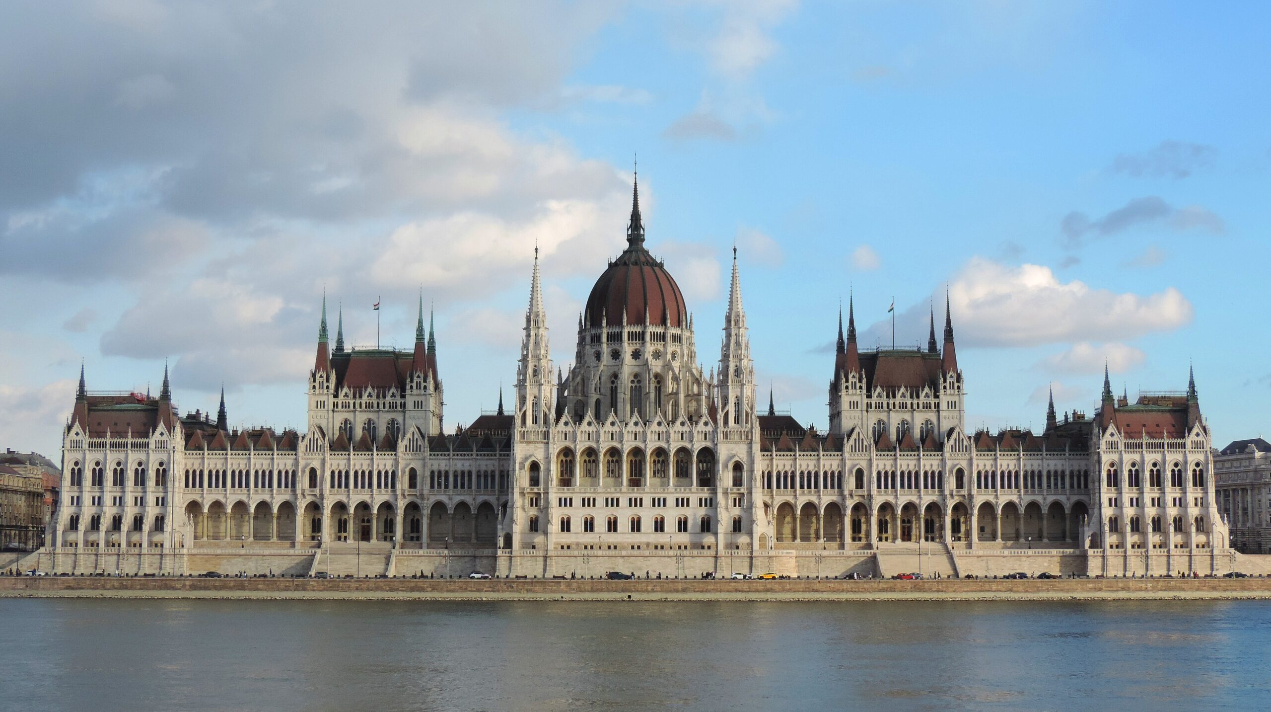 The Parliament glowing along the Danube.