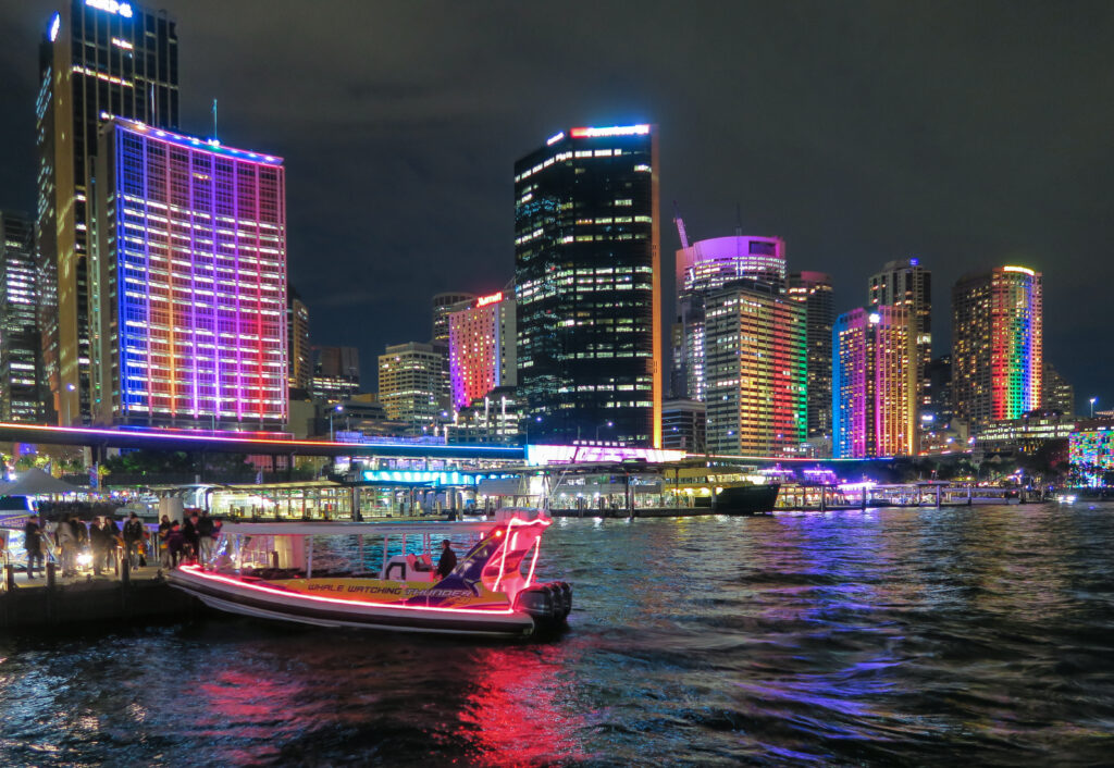 Sydney city skyline lit up in the evening in Sydney