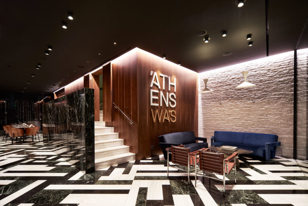Walnut-and-marble design lobby at the AthensWas hotel in Athens