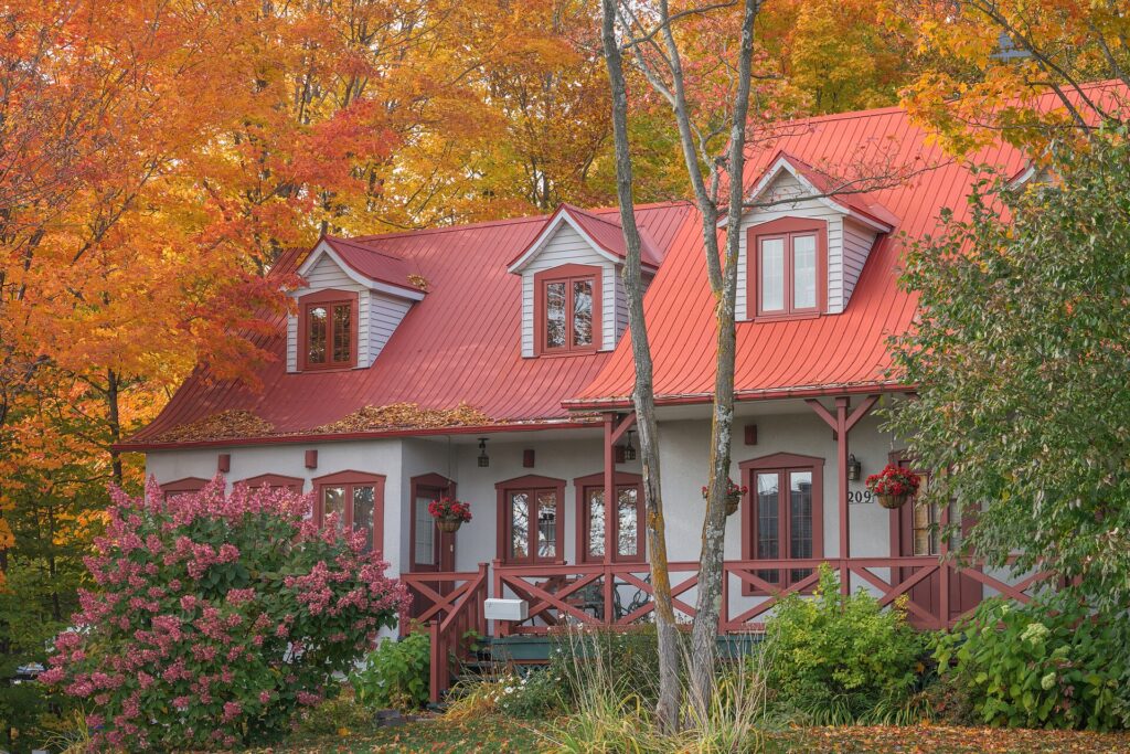 Autumnal Retreat in Old Quebec- A Canvas of Fading Reds and Vibrant Oranges in Quebec City