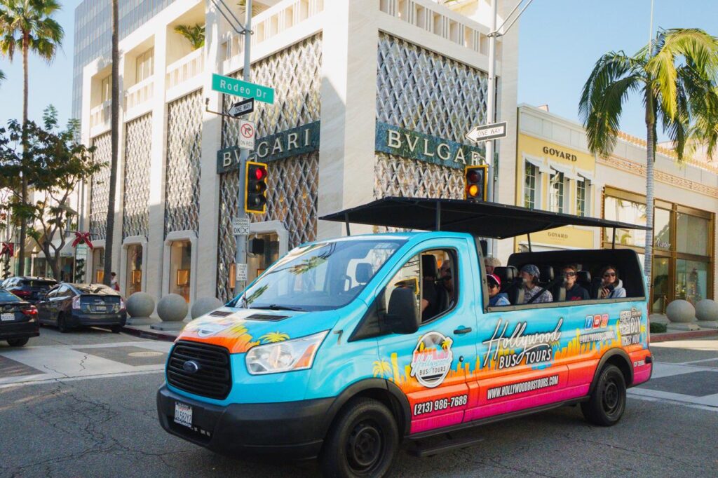 Open-air bus tour past celebrity homes in Los Angeles California