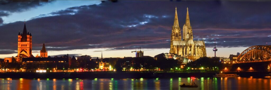 The Cologne old town waterfront on the Rhine at dusk