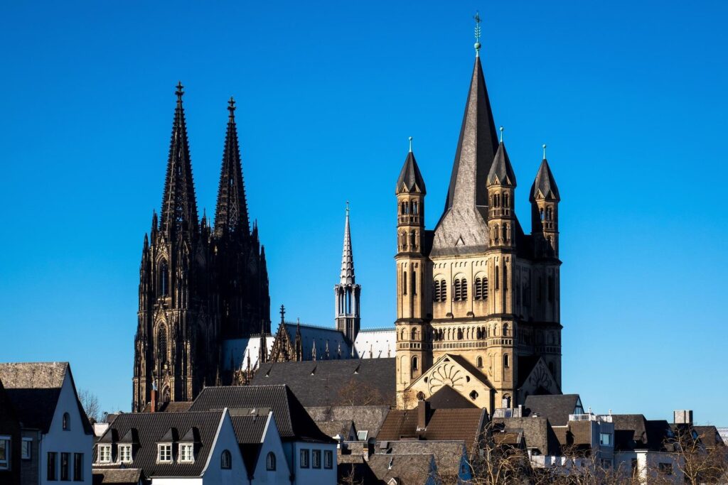 A guide leading a walking tour in Cologne old town