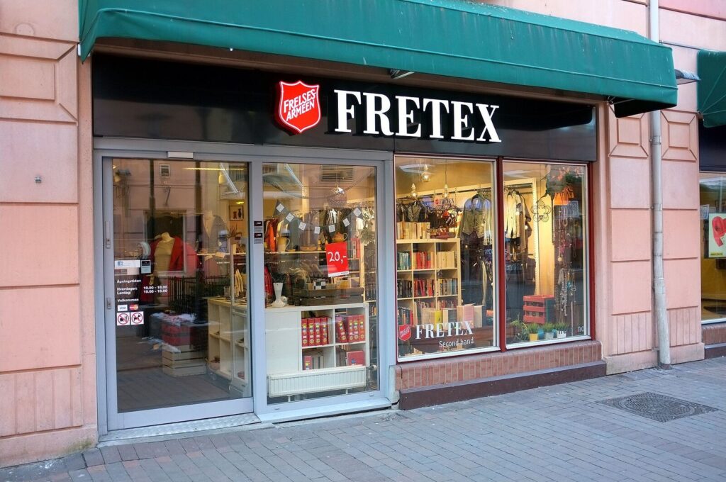 Fretex thrift store storefront with red sign in Oslo