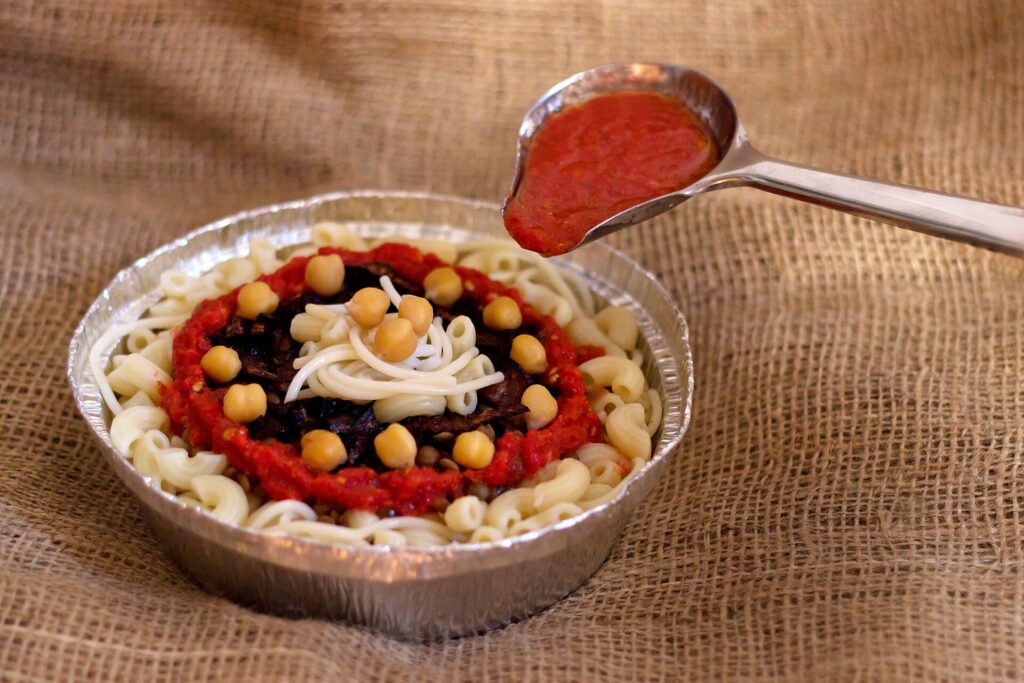 A bowl of Egyptian koshary the beloved national dish