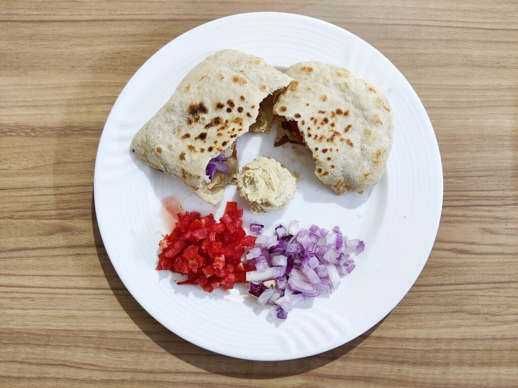 Fresh-baked Arab flatbread and mezze, as served at Reem's California