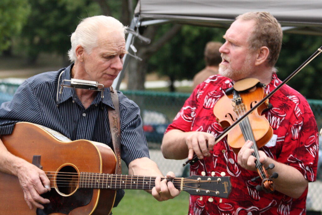 An intimate acoustic guitar performance, in the spirit of the Bluebird Cafe