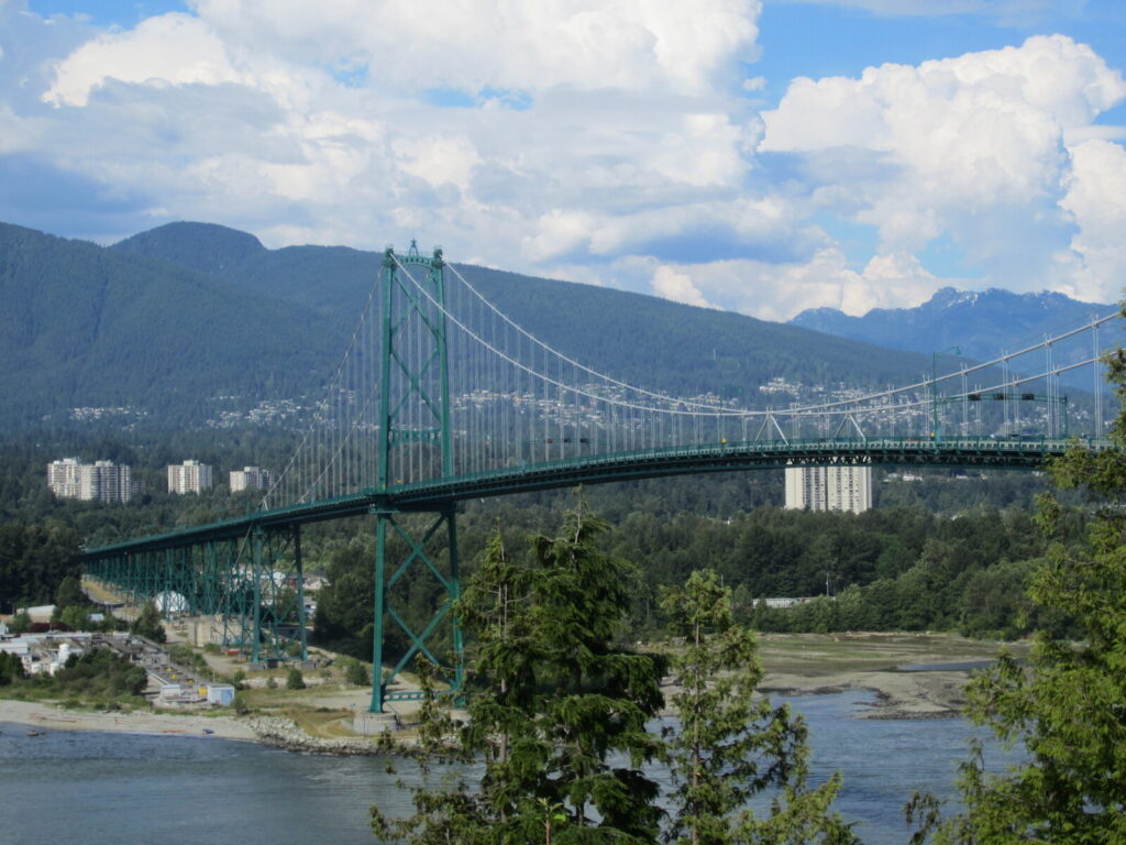 Lions Gate Bridge over Burrard Inlet on a bright day in Vancouver