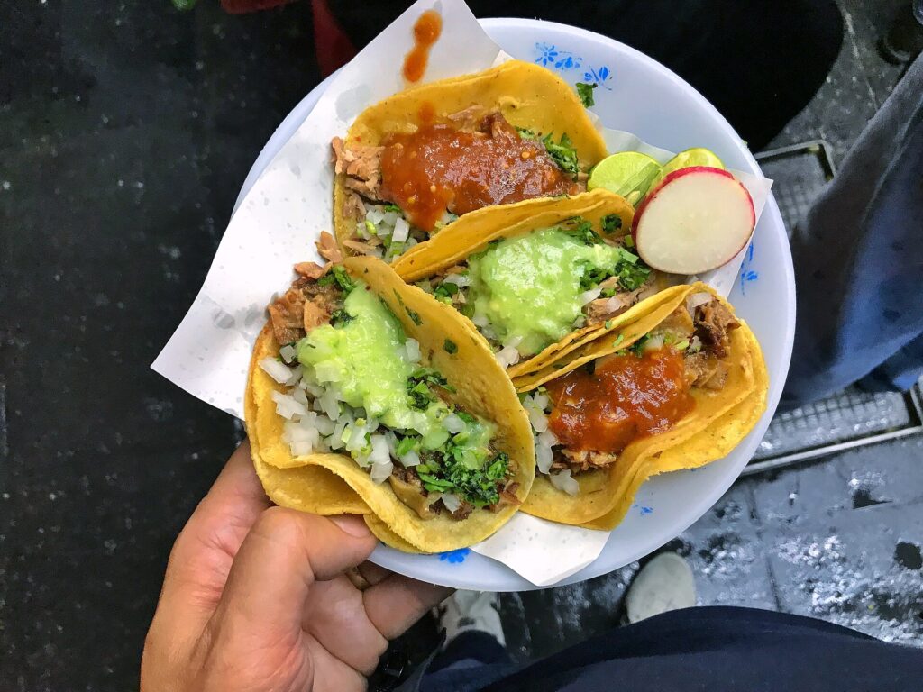 Suadero tacos with green salsa at Los Cocuyos in Mexico City