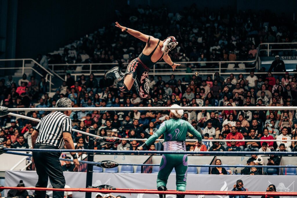 Masked lucha libre wrestlers in the ring in Mexico City