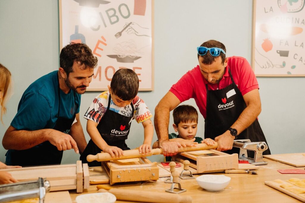 Hands-on pasta-making class with instructors and guests in Rome