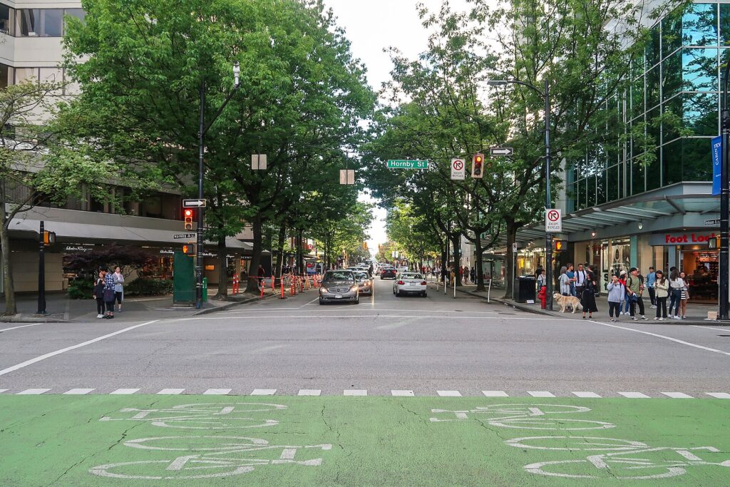 The tree-lined Robson Street shopping strip in Vancouver