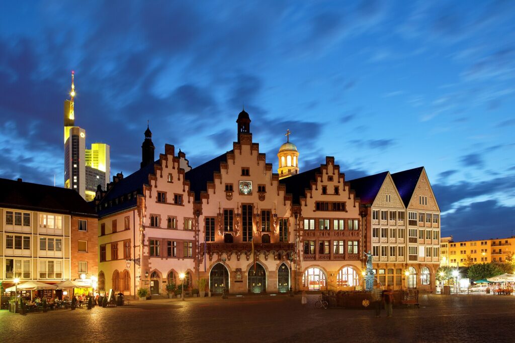 Half-timbered houses on the Roemerberg square in Frankfurt at dusk