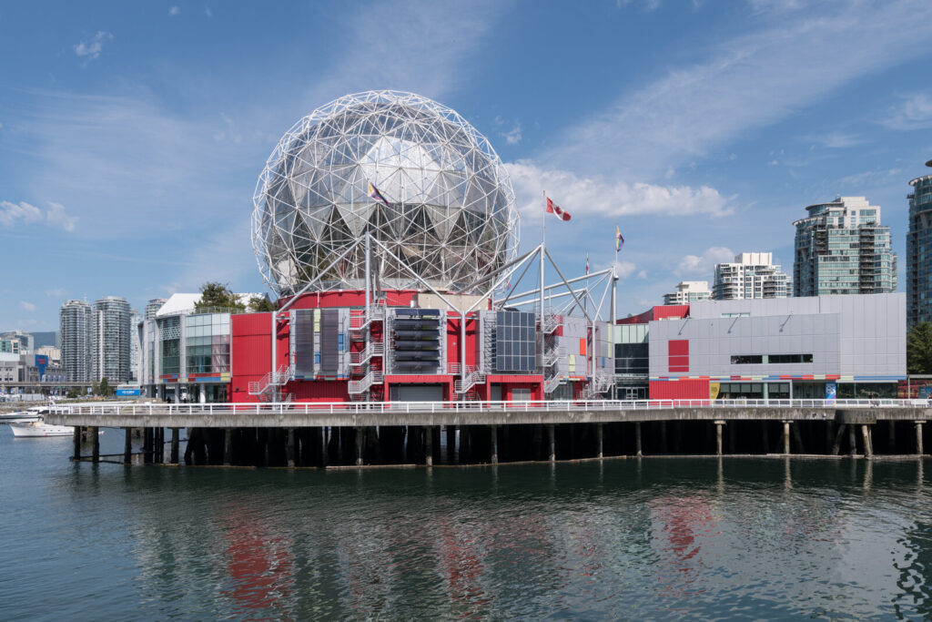 Science World geodesic dome reflected in False Creek in Vancouver