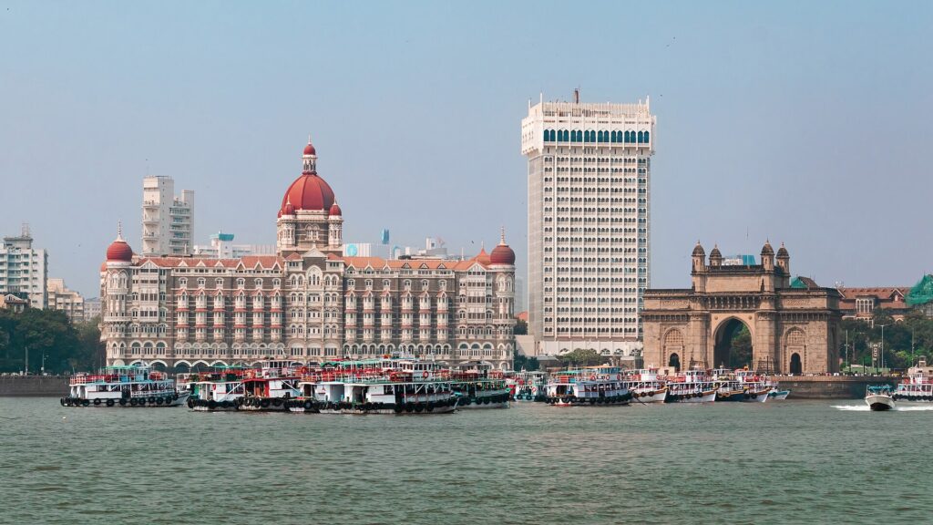 Panoramic view of Taj Palace Hotel and Taj Tower with the iconic Gateway of India in the background