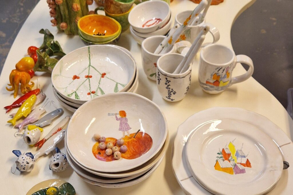 Hand-sculpting and painting a ceramic at a Tallinn craft workshop