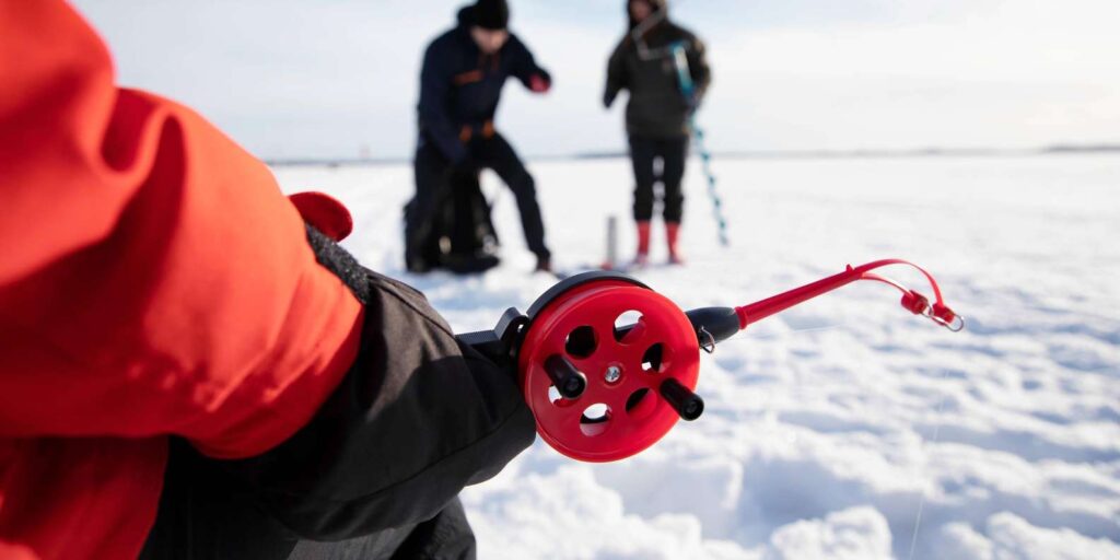 Sodankylä Snowmobile and Ice Fishing Adventure